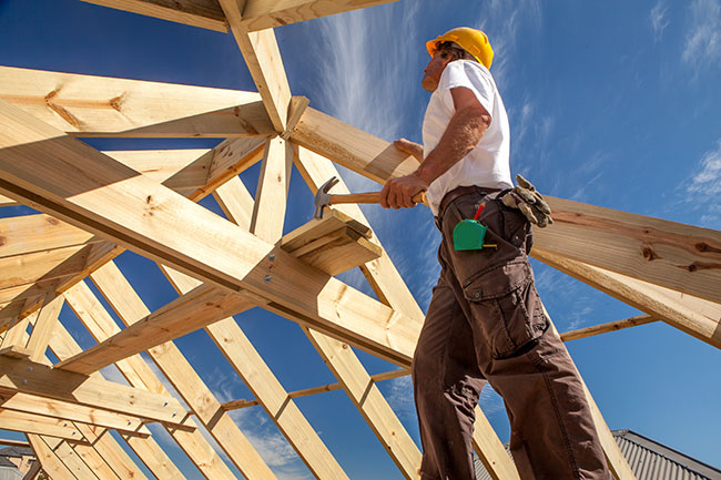 Worker building a home