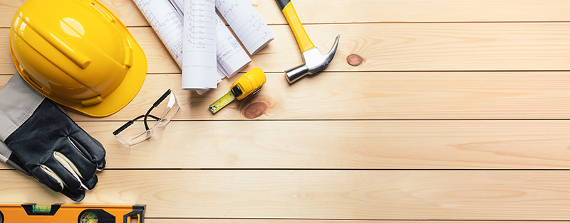Building materials on wood background